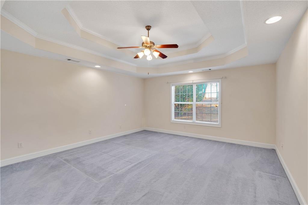 523 Barhams Ridge Drive McDonough, GA 30252 - Photo 19 of 43 a view of an empty room with a window