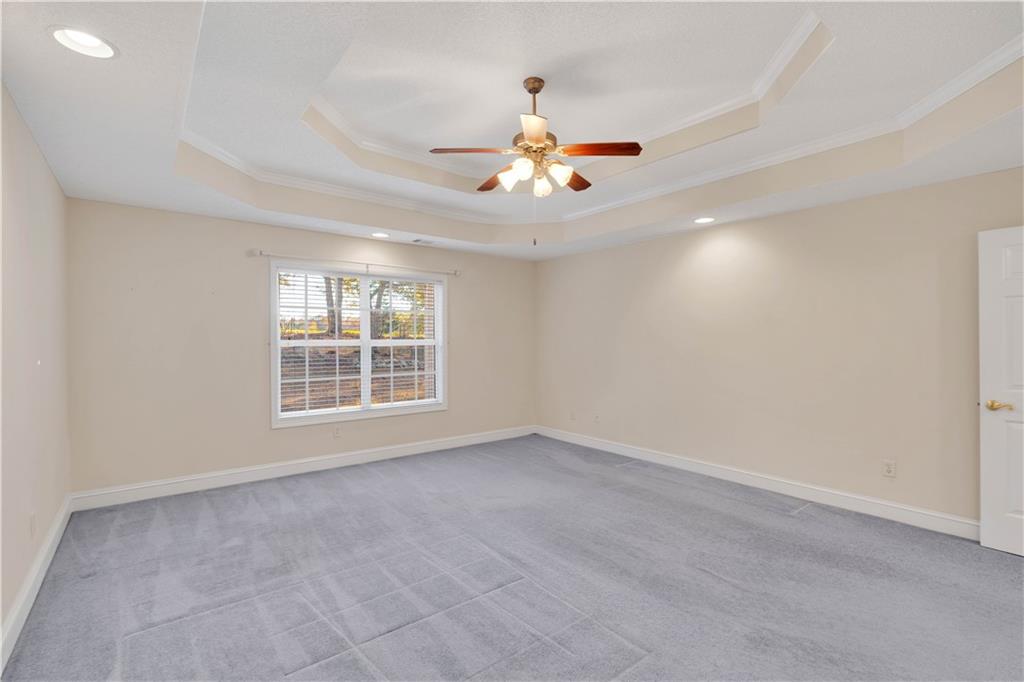 523 Barhams Ridge Drive McDonough, GA 30252 - Photo 31 of 43 a view of an empty room with a window