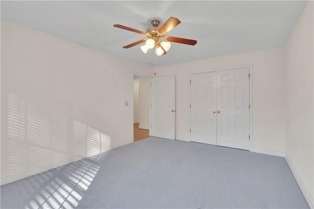 523 Barhams Ridge Drive McDonough, GA 30252 - Photo 32 of 43 a view of an empty room with a window