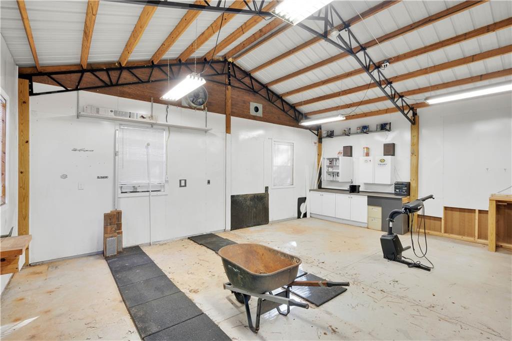 523 Barhams Ridge Drive McDonough, GA 30252 - Photo 38 of 43 a living room with furniture and a ceiling fan