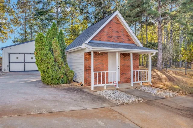 front view of a house with a yard