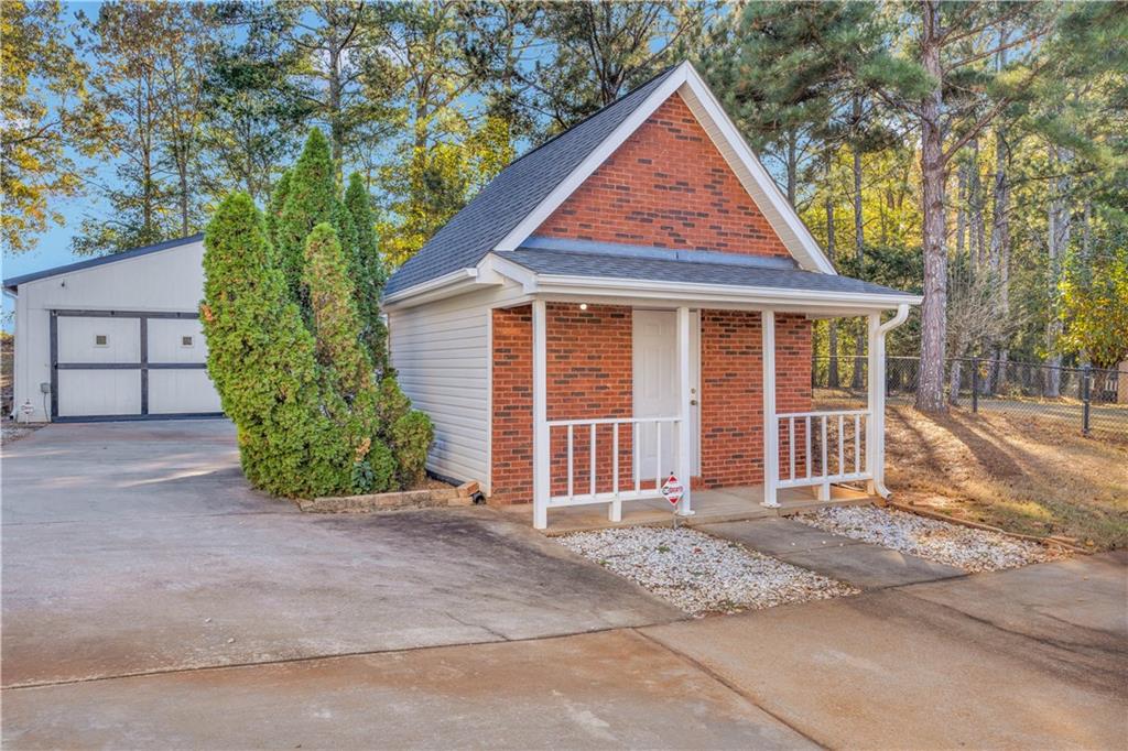 523 Barhams Ridge Drive McDonough, GA 30252 - Photo 7 of 43 front view of a house with a yard