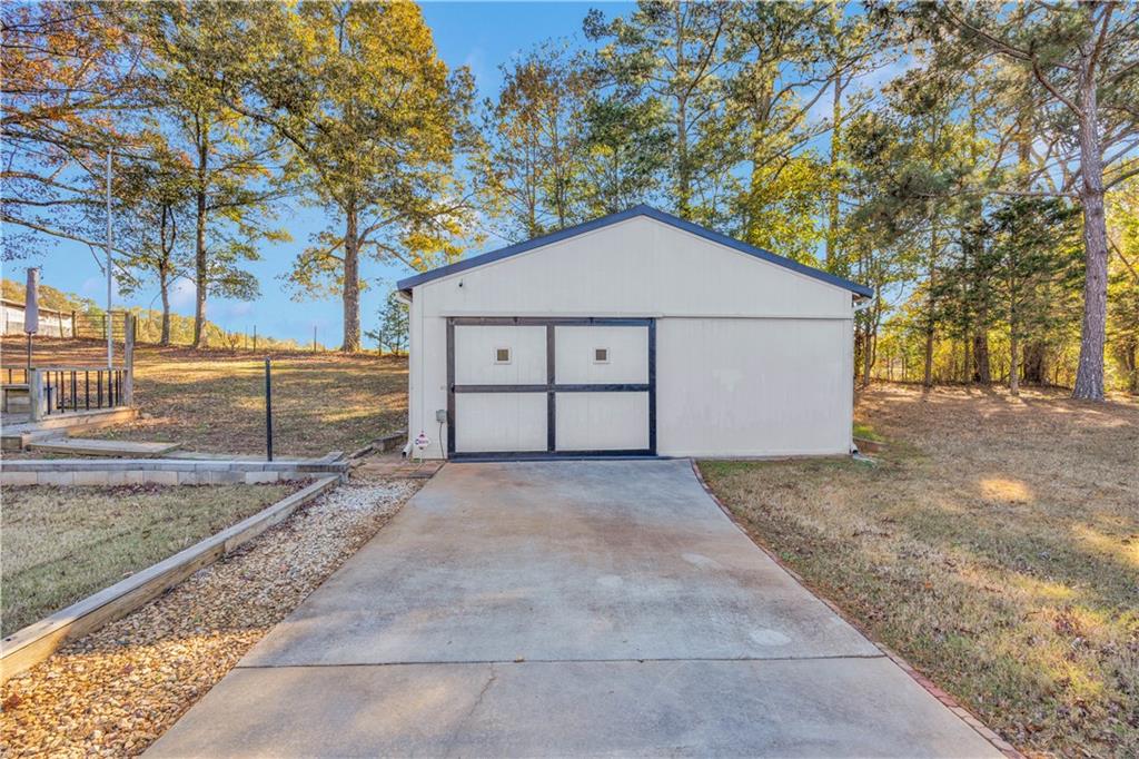 523 Barhams Ridge Drive McDonough, GA 30252 - Photo 8 of 43 a view of a house with a yard