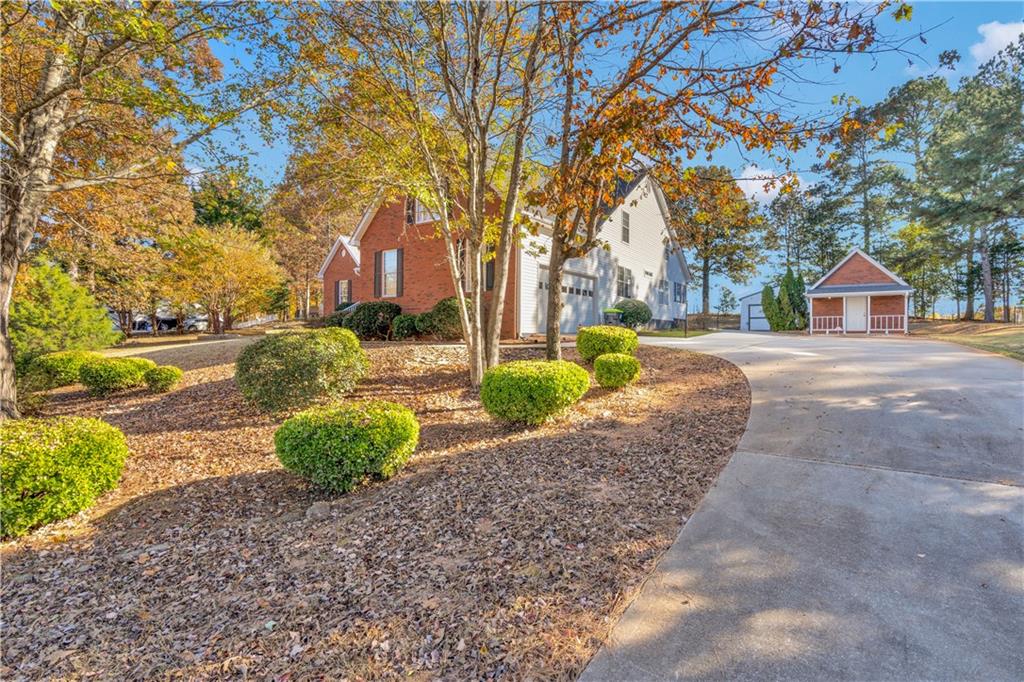 523 Barhams Ridge Drive McDonough, GA 30252 - Photo 9 of 43 a street view with large trees