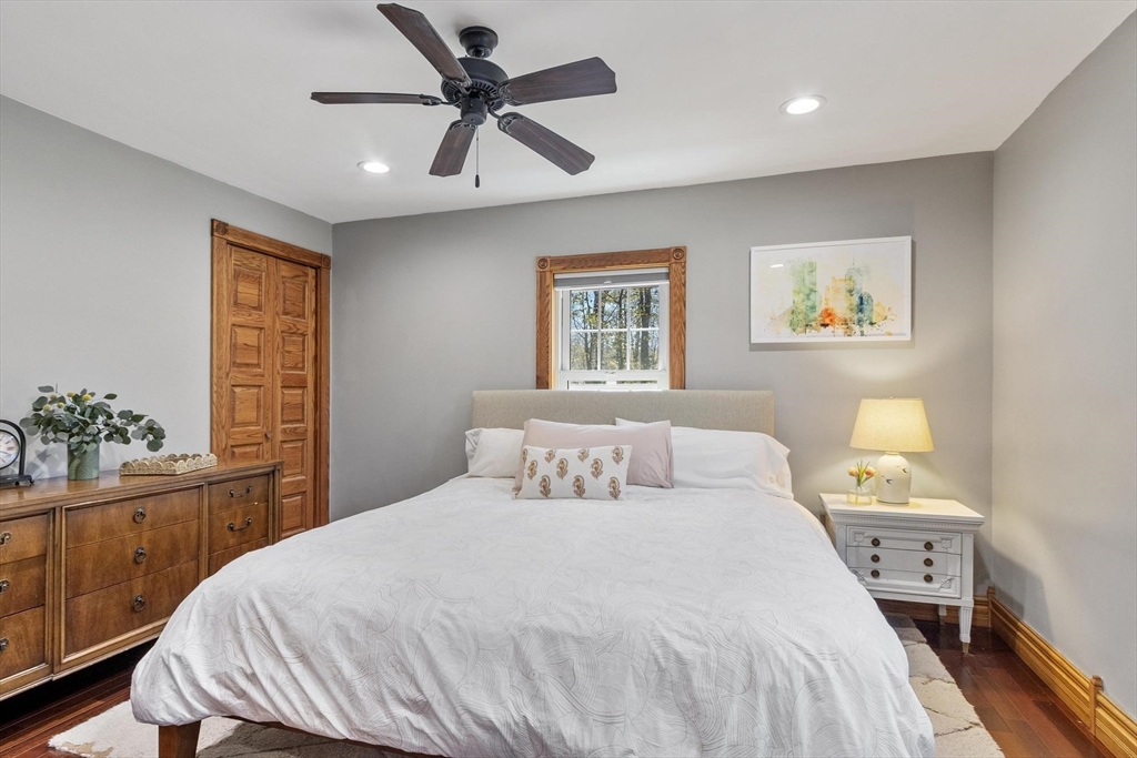 203 Main Street Acton, MA 01720 - Photo 29 of 42 a bedroom with a large bed and a window