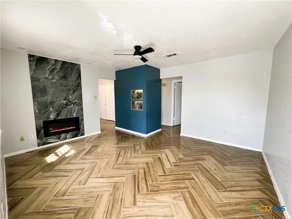 a view of a livingroom with a fireplace