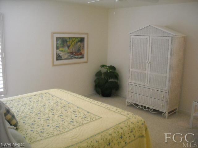 491 Rabbit Road Sanibel, FL 33957 - Photo 8 of 9 a bed sitting in a bedroom and closet