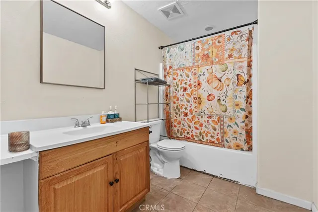 a view of bathroom with a sink toilet and shower
