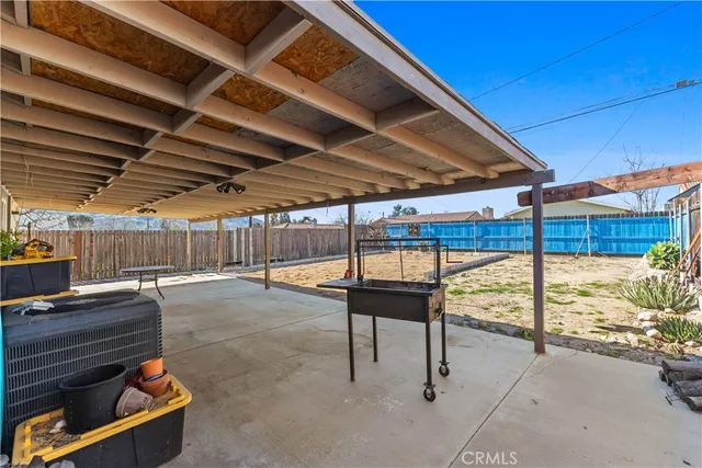 a view of a backyard of the house