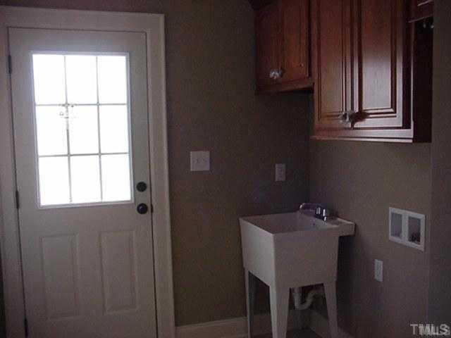 60 North Sunset Ridge Drive Willow Spring, NC 27592 - Photo 12 of 12 Laundry Room