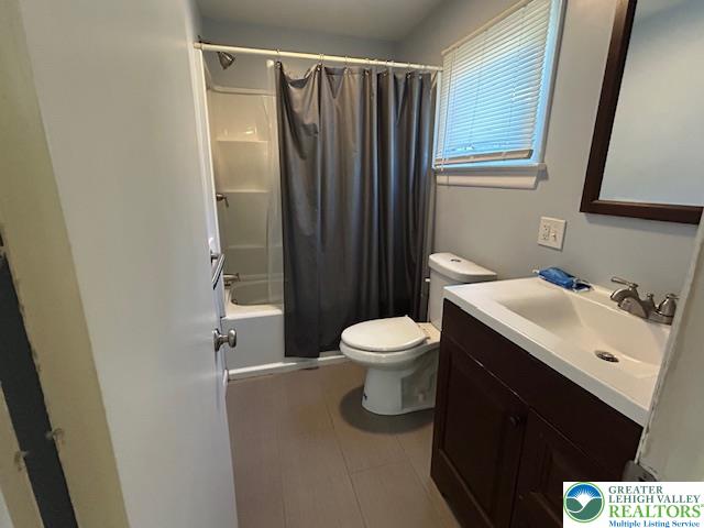 2065 Hopewell Road Bethlehem, PA 18017 - Photo 12 of 19 Functional full bathroom with a bright window, combining practicality and light.