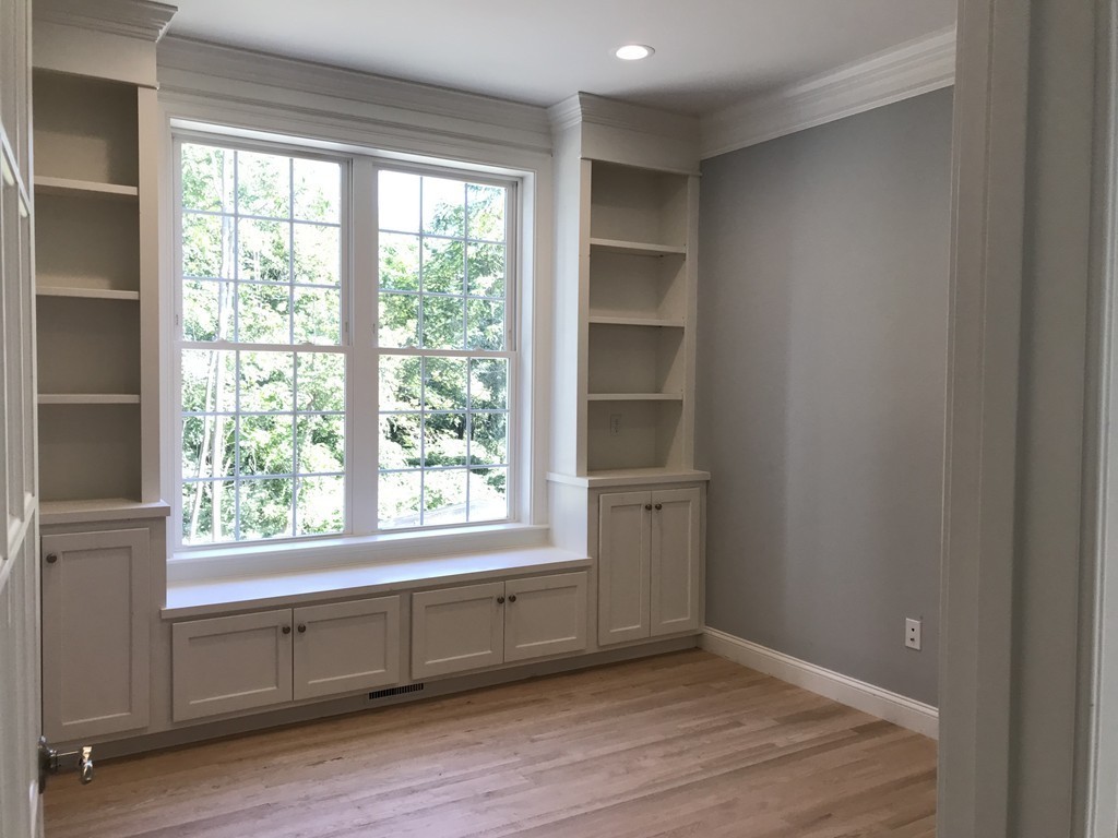 57 Wellesley Rd Extension Natick, MA 01760 - Photo 12 of 26 an empty room with wooden floor and windows