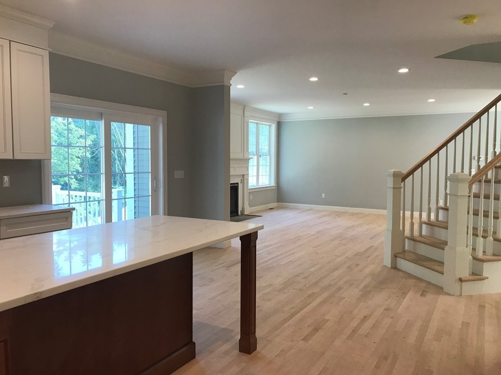57 Wellesley Rd Extension Natick, MA 01760 - Photo 5 of 26 a view of an empty room with a window