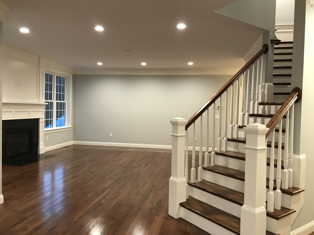 57 Wellesley Rd Extension Natick, MA 01760 - Photo 8 of 26 a view of entryway and hall with wooden floor