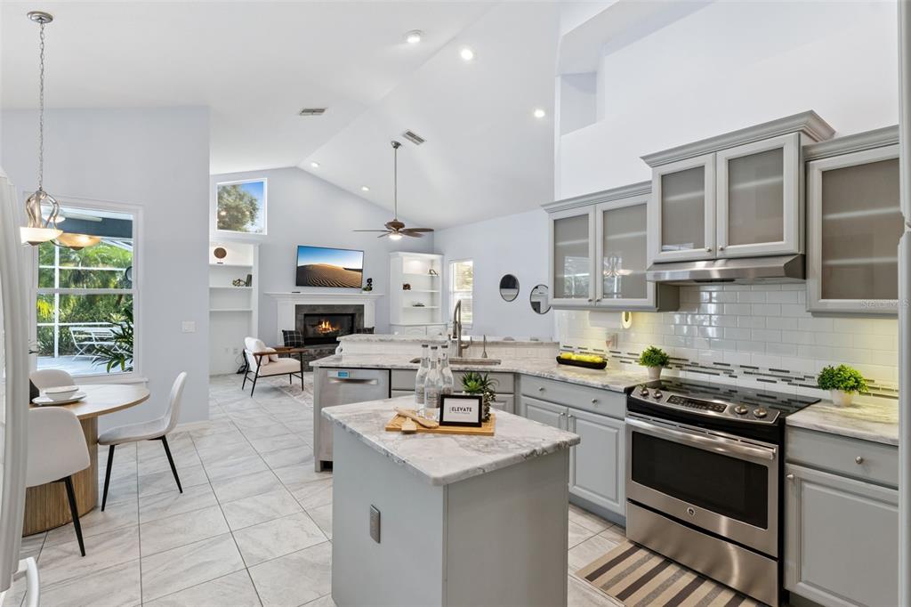 2125 Kane Park Way Windermere, FL 34786 - Photo 20 of 63 a kitchen with a sink stove and cabinets