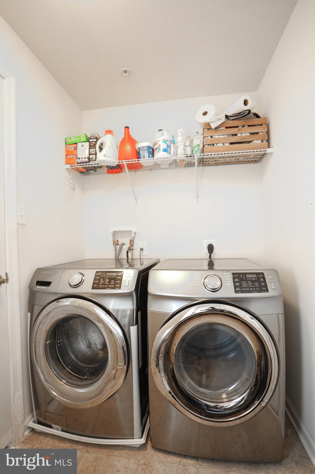 1024 Cook Drive Southeast Washington, DC 20032 - Photo 35 of 44 a utility room with sink dryer and washer