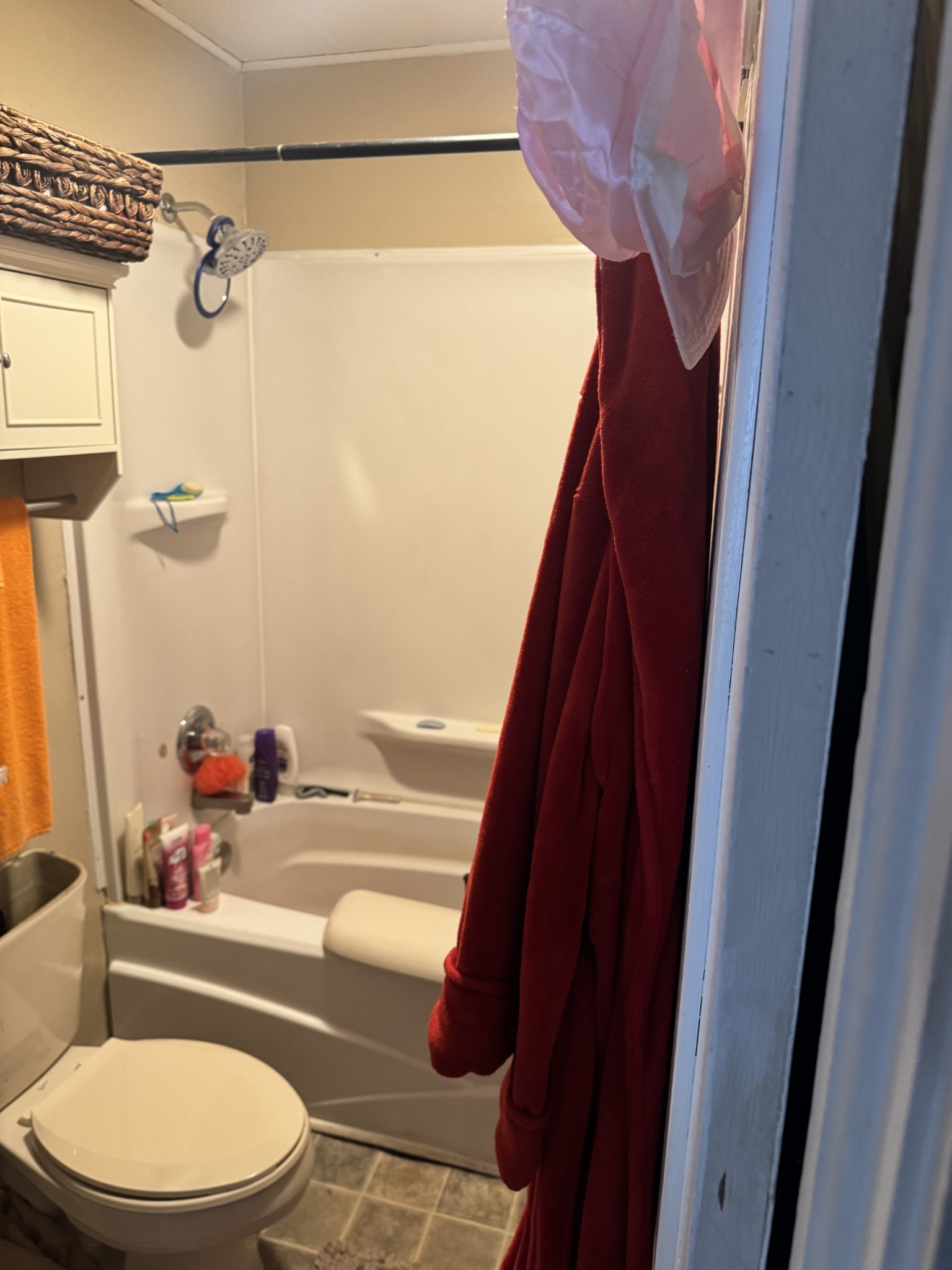 100 Indian Creek Road McEwen, TN 37101 - Photo 11 of 14 a bathroom with a toilet and a shower curtain
