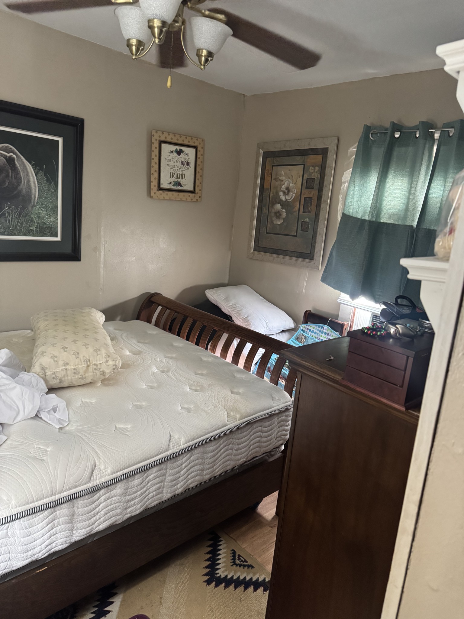 100 Indian Creek Road McEwen, TN 37101 - Photo 12 of 14 a bedroom with bed and wooden floor