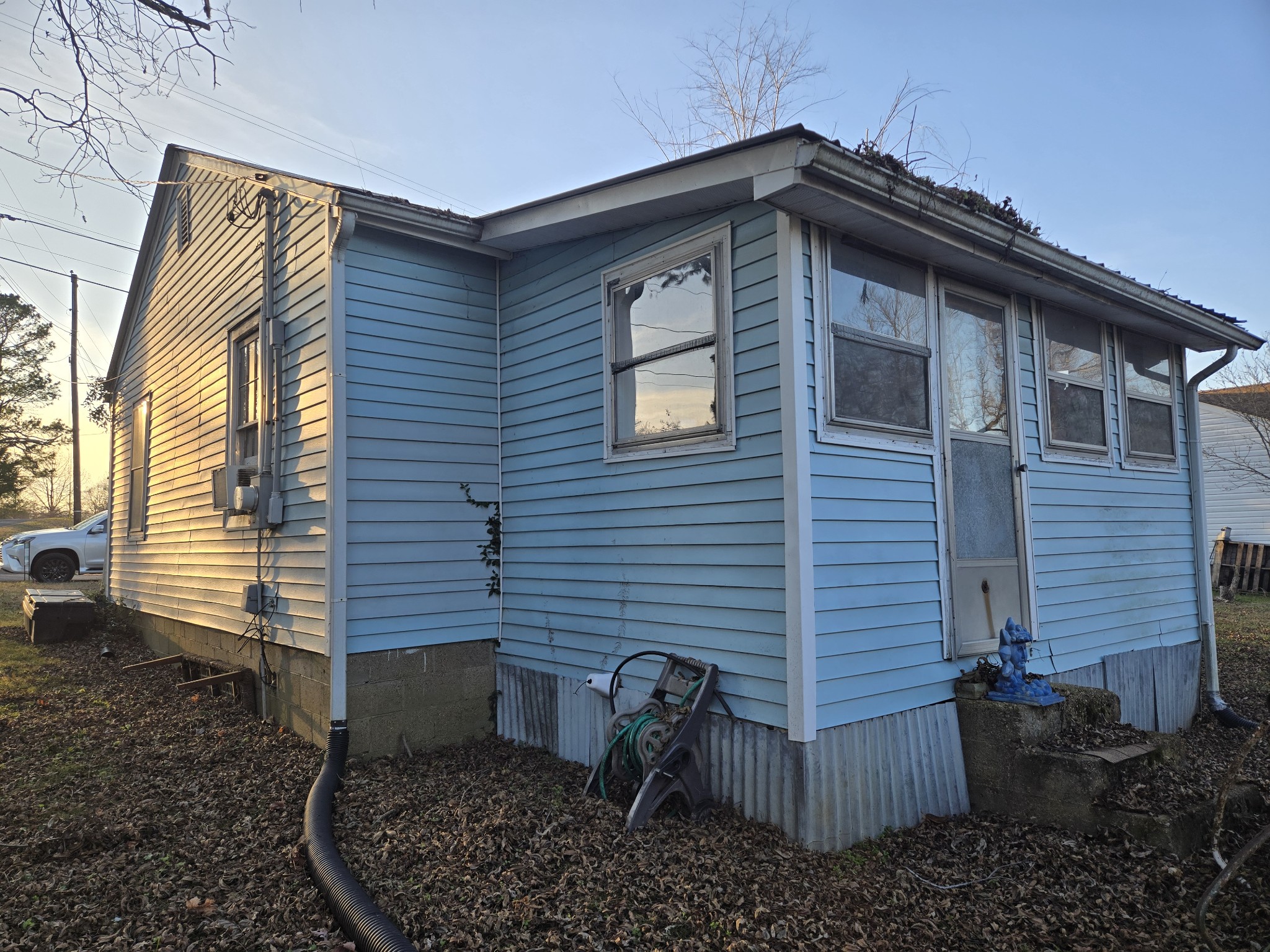 100 Indian Creek Road McEwen, TN 37101 - Photo 6 of 14 a view of a house with a yard and garage