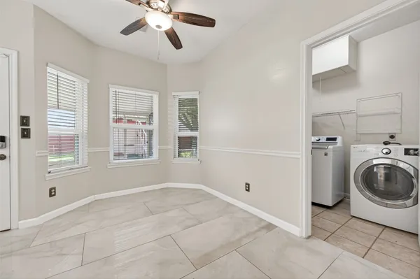 a view of a storage & utility room with washer and dryer