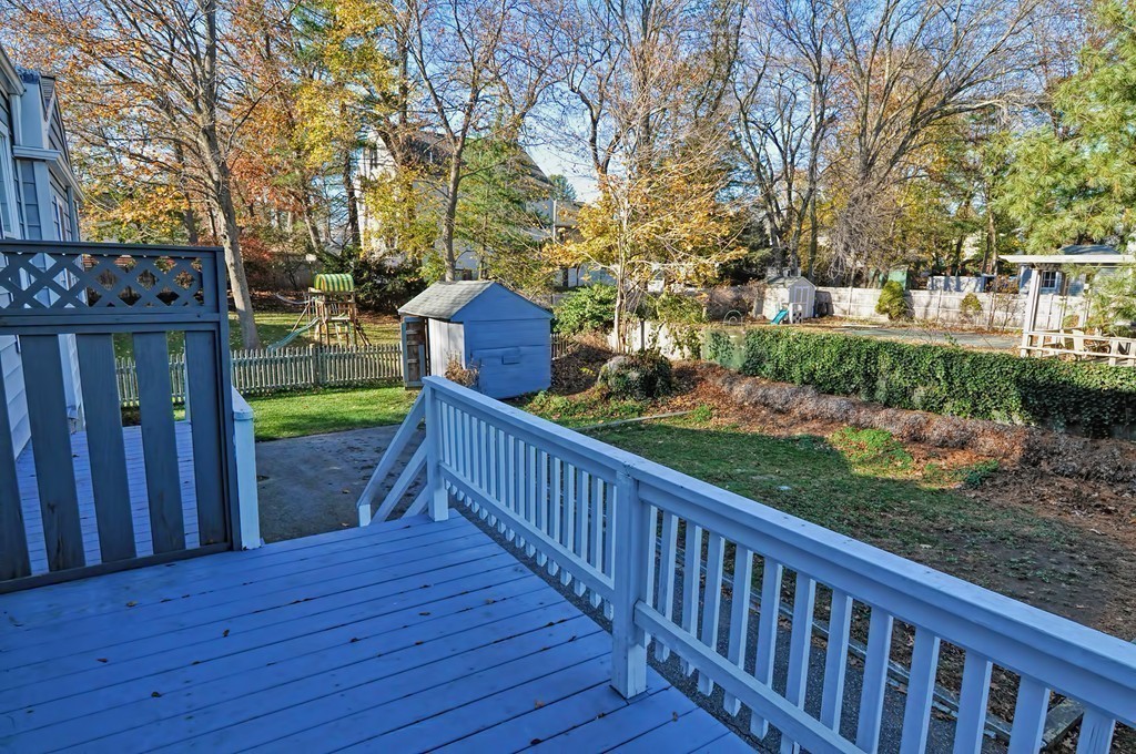 87-89 Pleasant Street Needham, MA 02492 - Photo 30 of 30 a view of a wooden deck and a yard