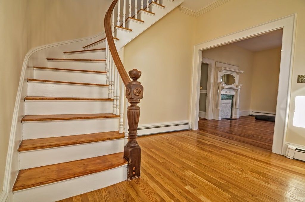 87-89 Pleasant Street Needham, MA 02492 - Photo 4 of 30 a view of entryway and hall with wooden floor