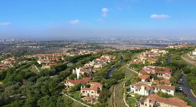 a view of a building with a yard