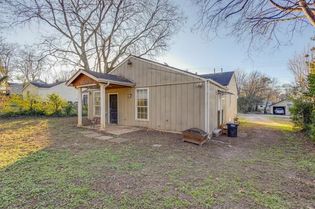 a view of a porch with backyard of the house