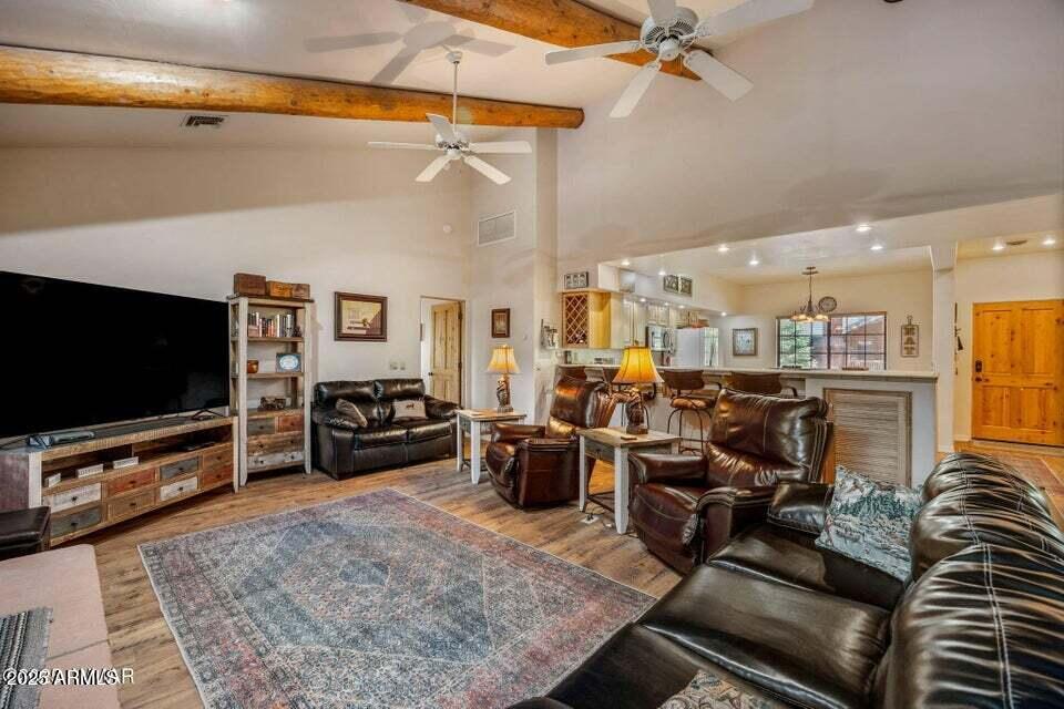 2522 Village Loop Pinetop, AZ 85935 - Photo 11 of 38 a living room with furniture and a flat screen tv