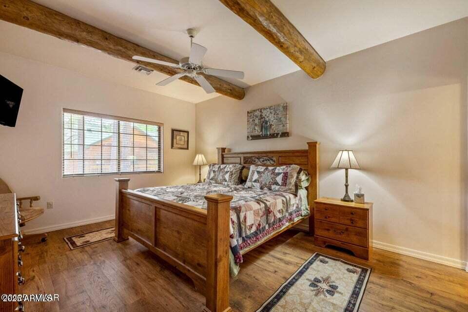 2522 Village Loop Pinetop, AZ 85935 - Photo 13 of 38 a bedroom with a bed and a window