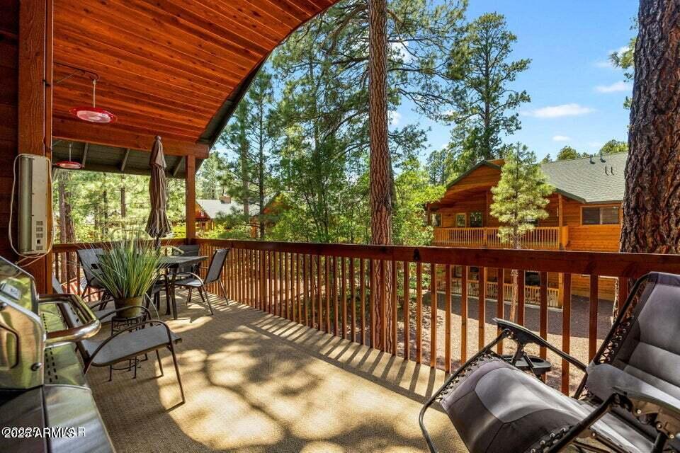 2522 Village Loop Pinetop, AZ 85935 - Photo 22 of 38 a view of a two chairs in the balcony