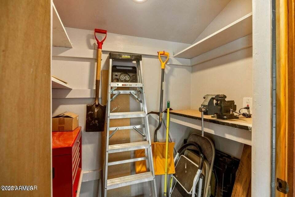2522 Village Loop Pinetop, AZ 85935 - Photo 27 of 38 a view of walk in closet with clothes and shoes