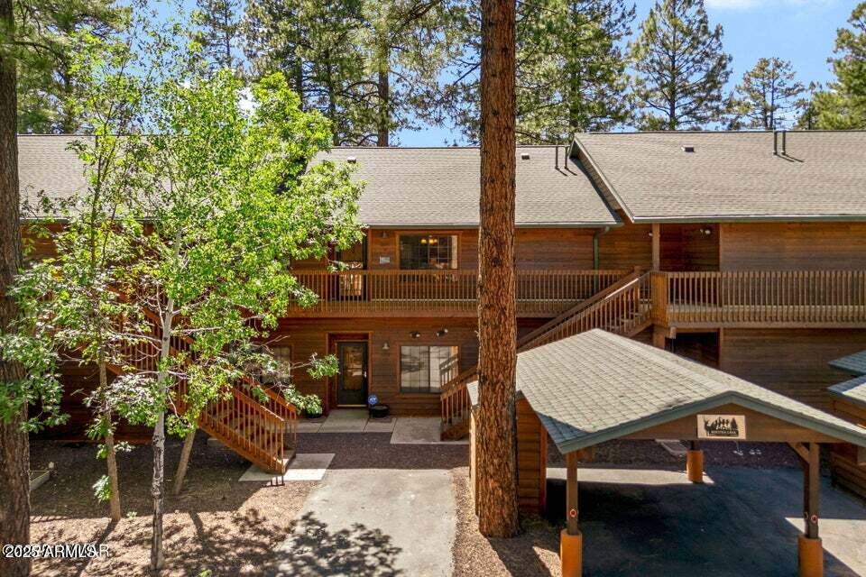 2522 Village Loop Pinetop, AZ 85935 - Photo 3 of 38 a view of house with backyard and seating