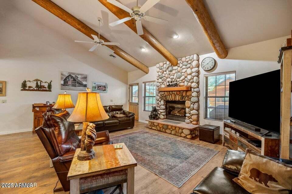 2522 Village Loop Pinetop, AZ 85935 - Photo 10 of 38 a living room with furniture and a flat screen tv