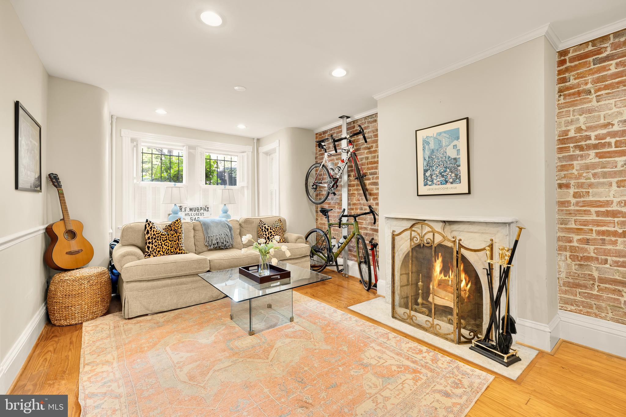 107 5th Street Southeast Washington, DC 20003 - Photo 13 of 26 a living room with furniture and a flat screen tv