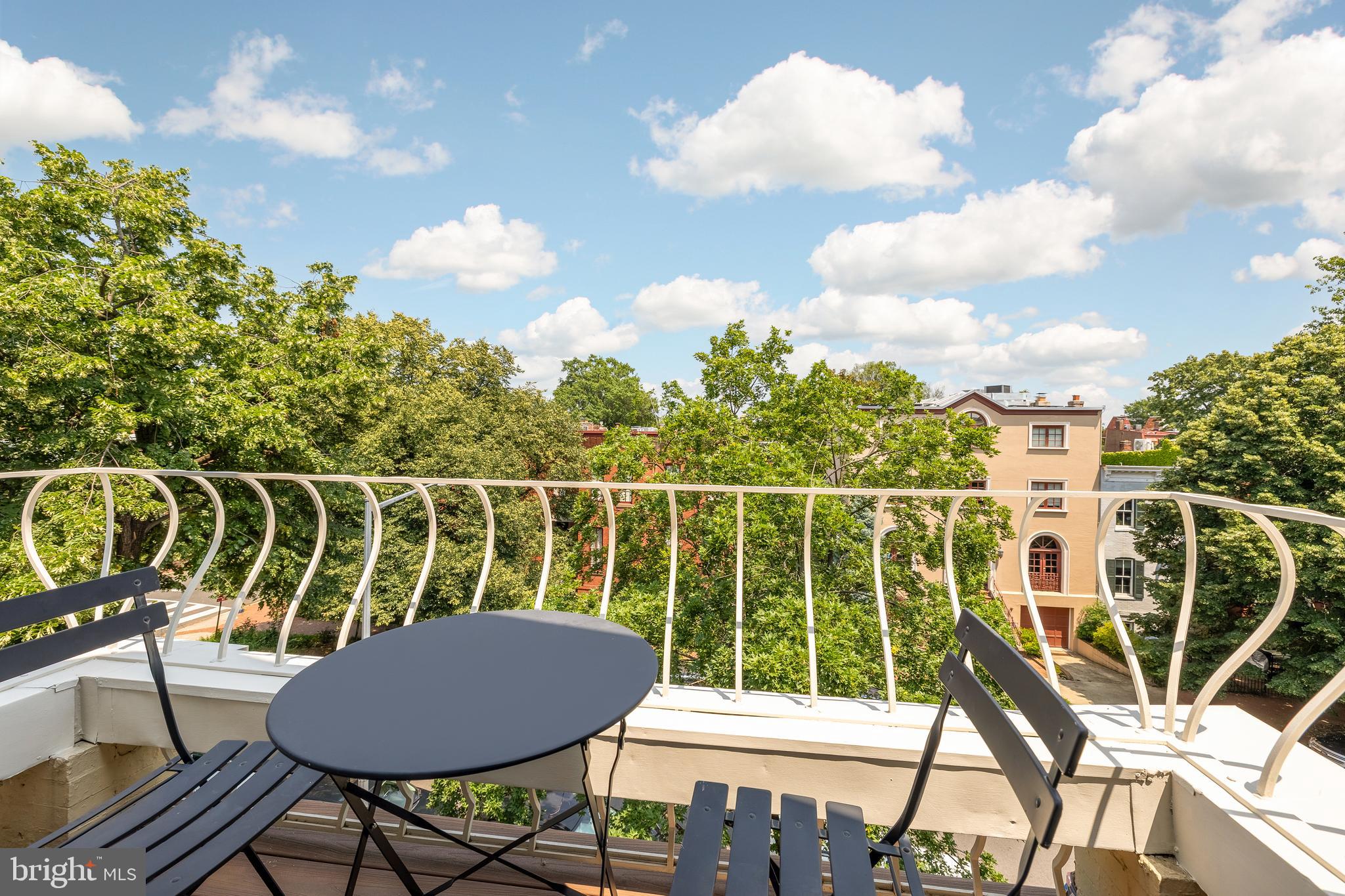 107 5th Street Southeast Washington, DC 20003 - Photo 24 of 26 a view of a chairs and table in the patio