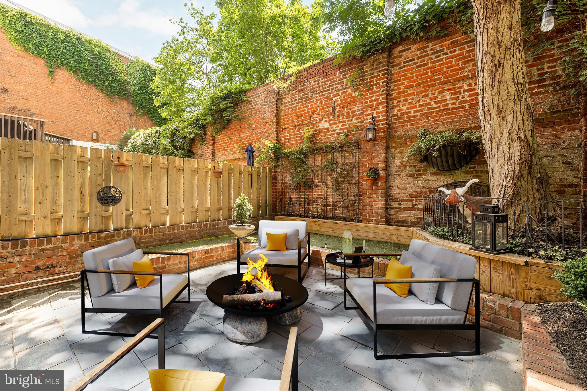 107 5th Street Southeast Washington, DC 20003 - Photo 25 of 26 a terrace with outdoor seating and trees