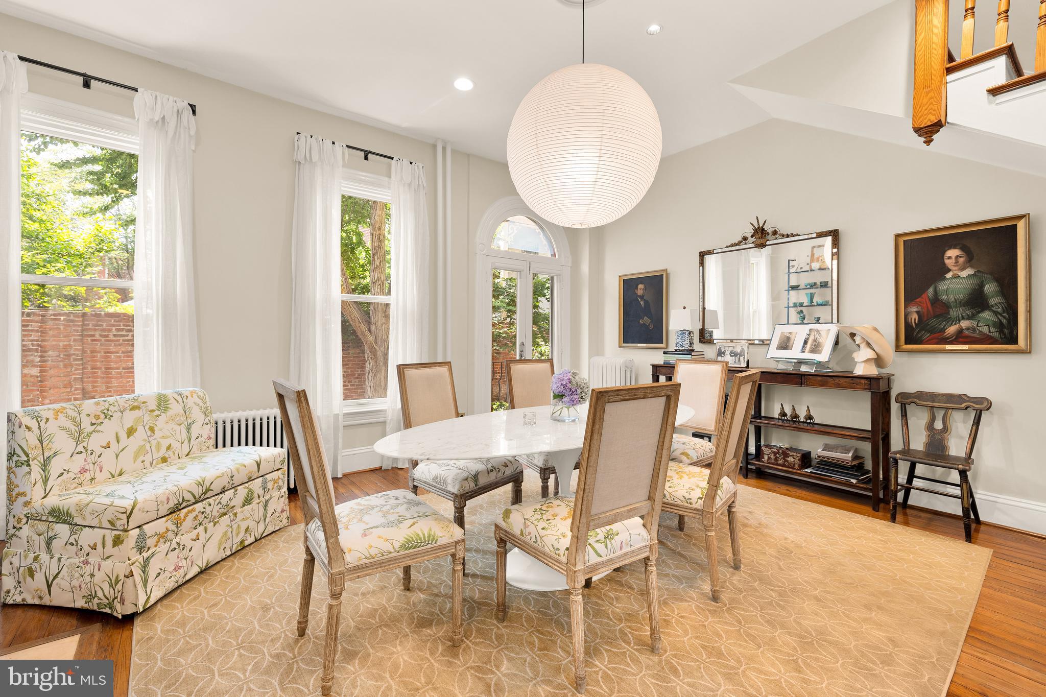 107 5th Street Southeast Washington, DC 20003 - Photo 7 of 26 a view of a dining room with furniture window and wooden floor