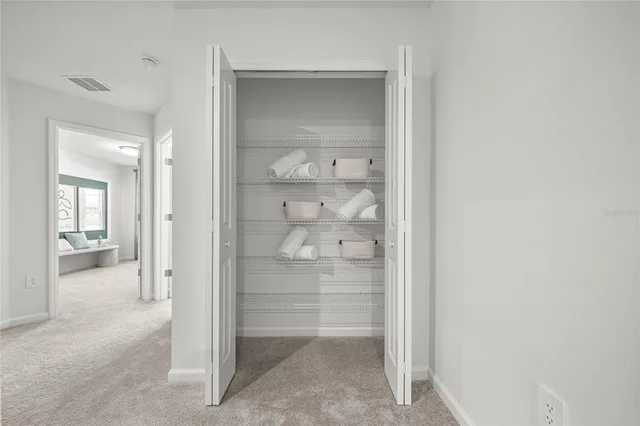 an empty room with mirror