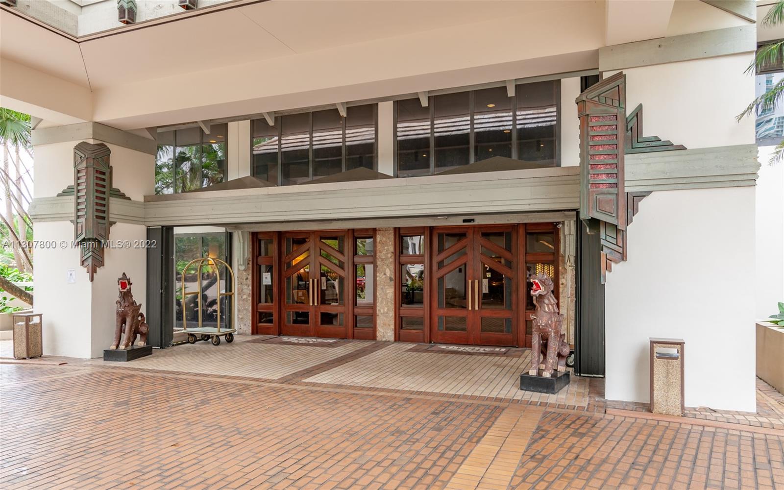 520 Brickell Key Drive, Unit A1603 Miami, FL 33131 - Photo 24 of 27 a view of a building with the entrance door