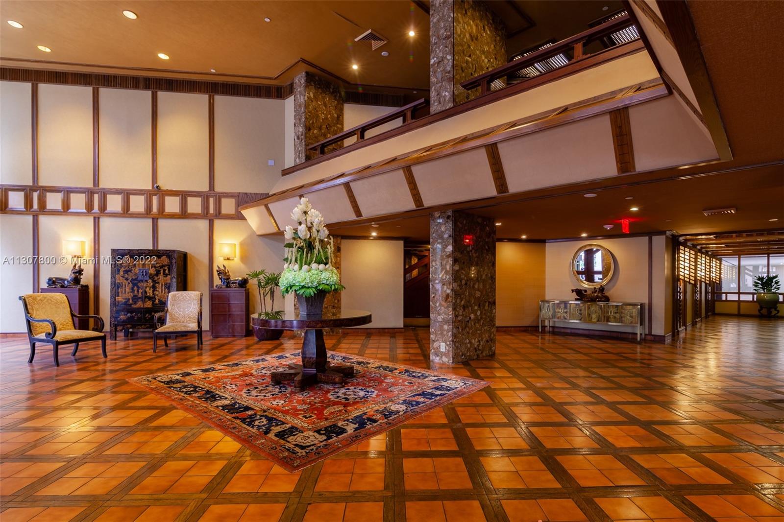 520 Brickell Key Drive, Unit A1603 Miami, FL 33131 - Photo 25 of 27 a view of a swimming pool with chairs