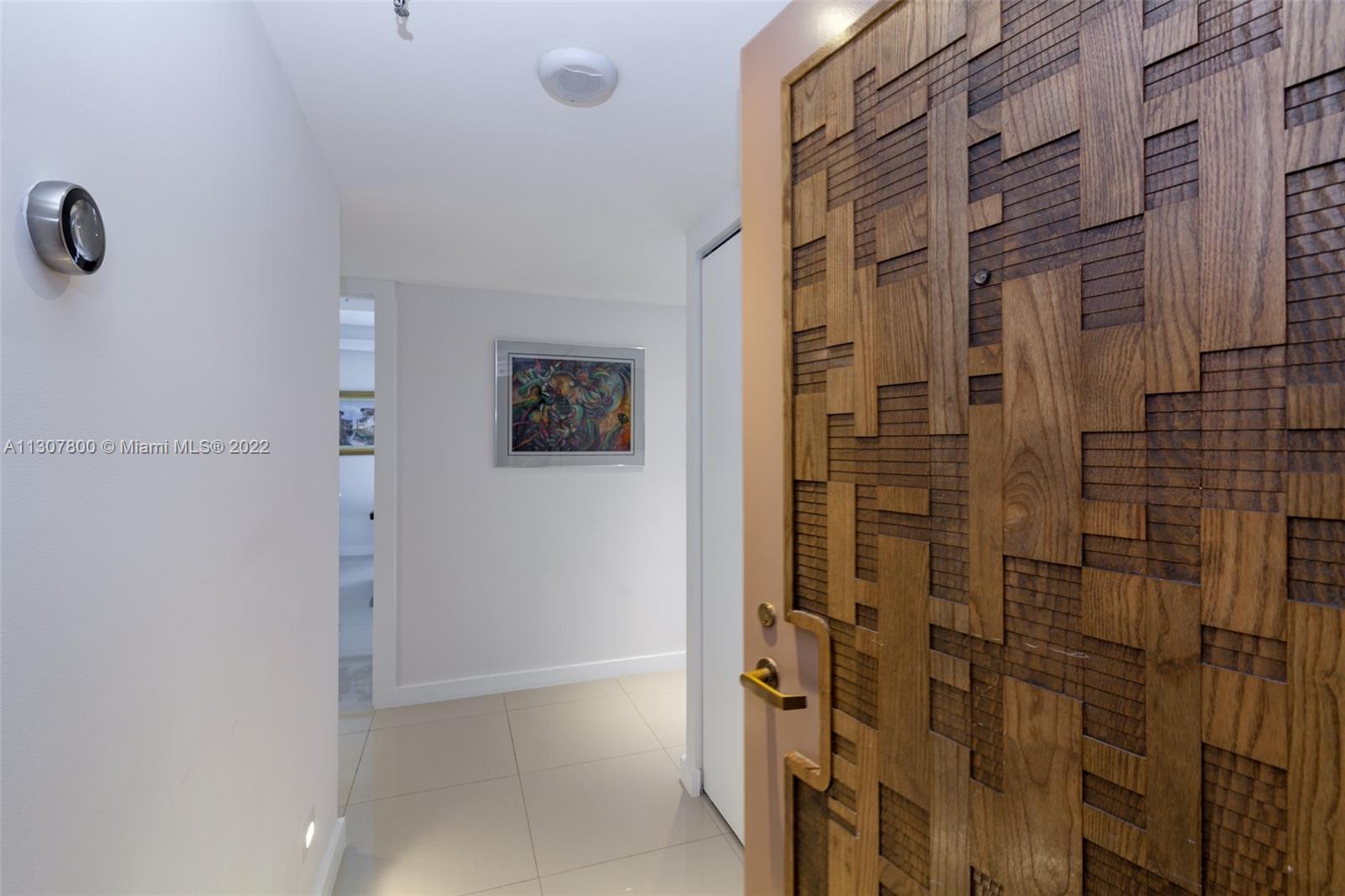 520 Brickell Key Drive, Unit A1603 Miami, FL 33131 - Photo 5 of 27 a bathroom with a shower