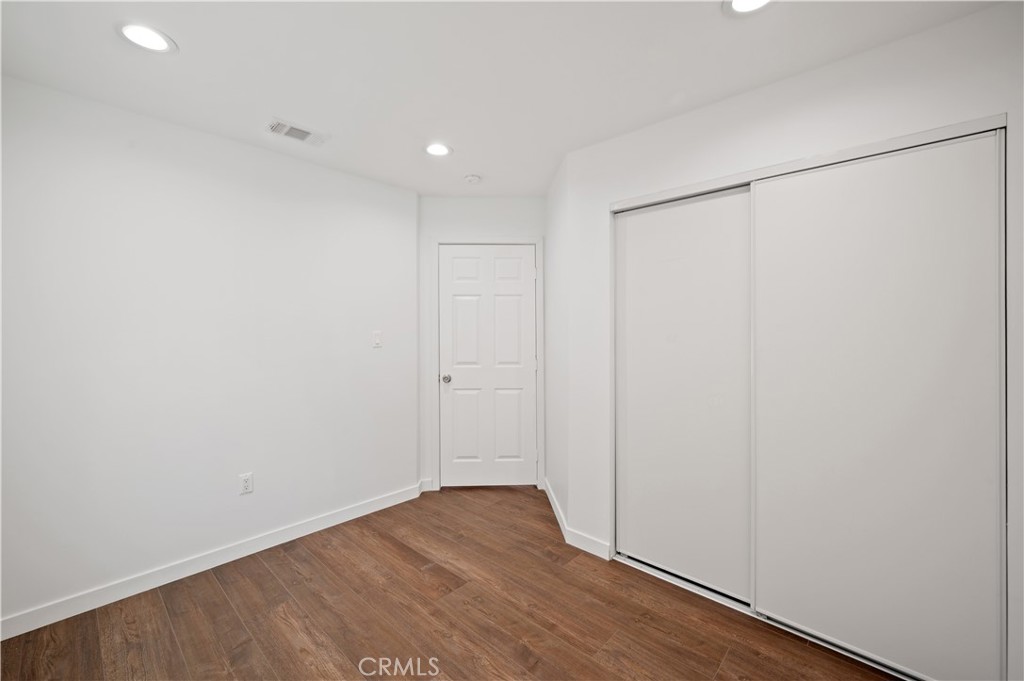 7445 Balcom Avenue Reseda, CA 91335 - Photo 28 of 73 a view of small space with wooden floor