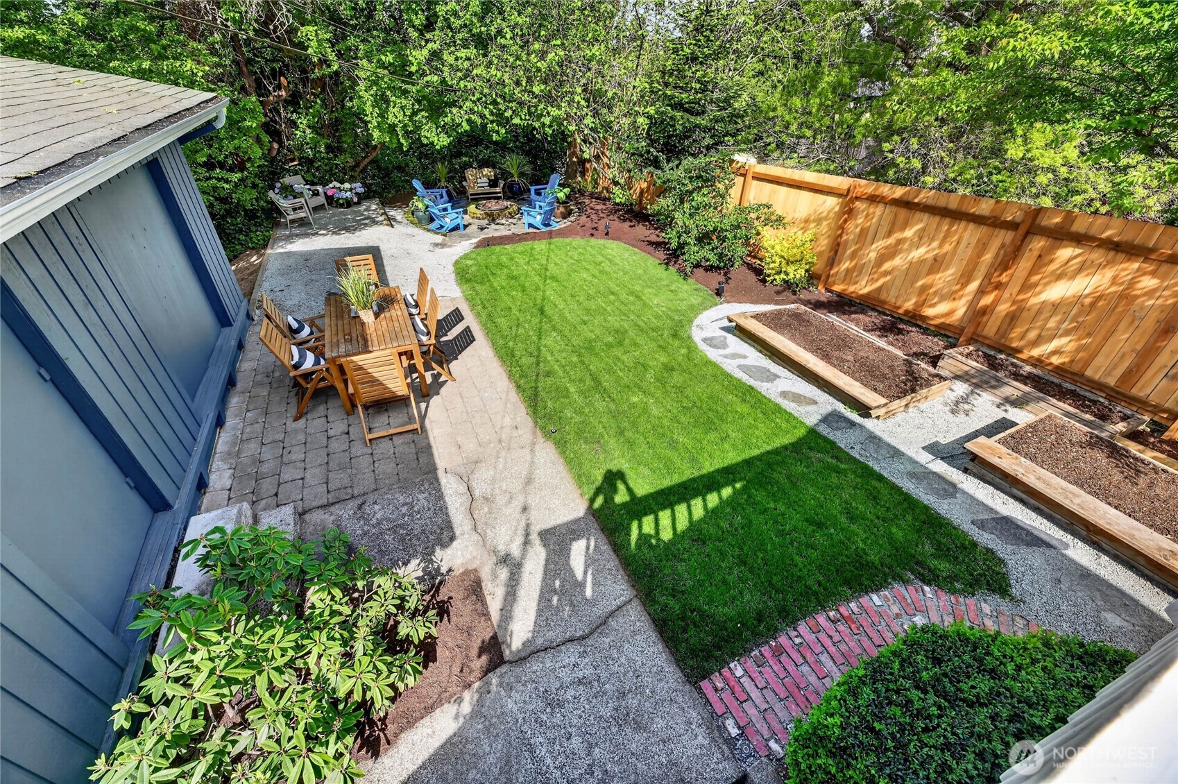 3245 45th Avenue Southwest Seattle, WA 98116 - Photo 12 of 31 a view of a backyard with sitting area