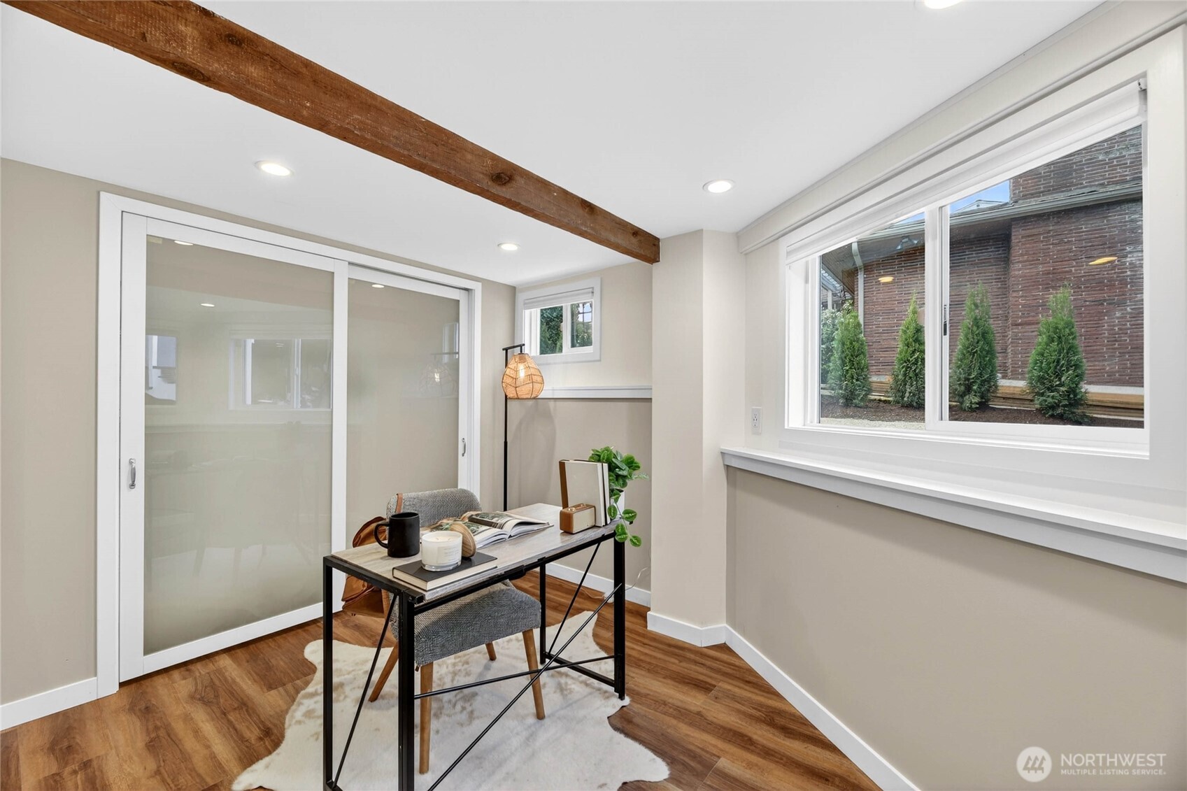 3245 45th Avenue Southwest Seattle, WA 98116 - Photo 22 of 31 a workspace with furniture and window