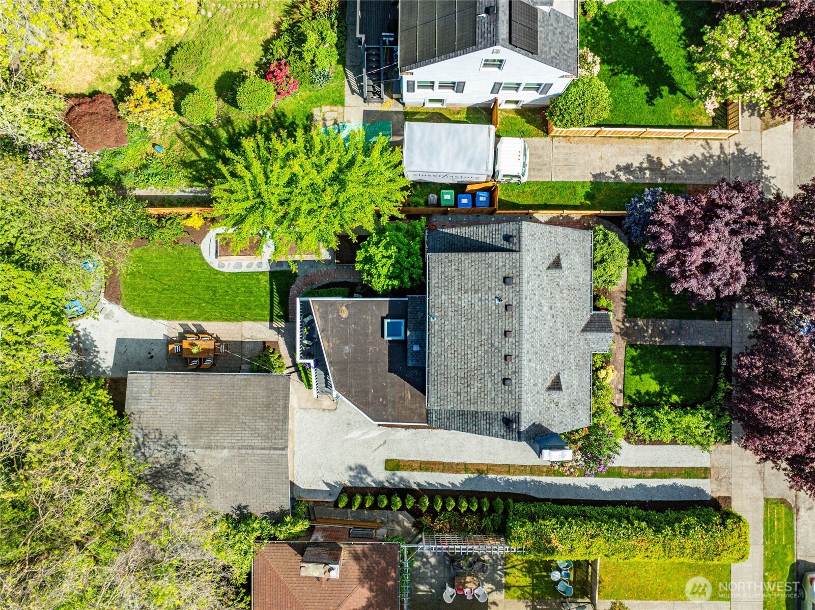 3245 45th Avenue Southwest Seattle, WA 98116 - Photo 29 of 31 an aerial view of a house with swimming pool and outdoor seating