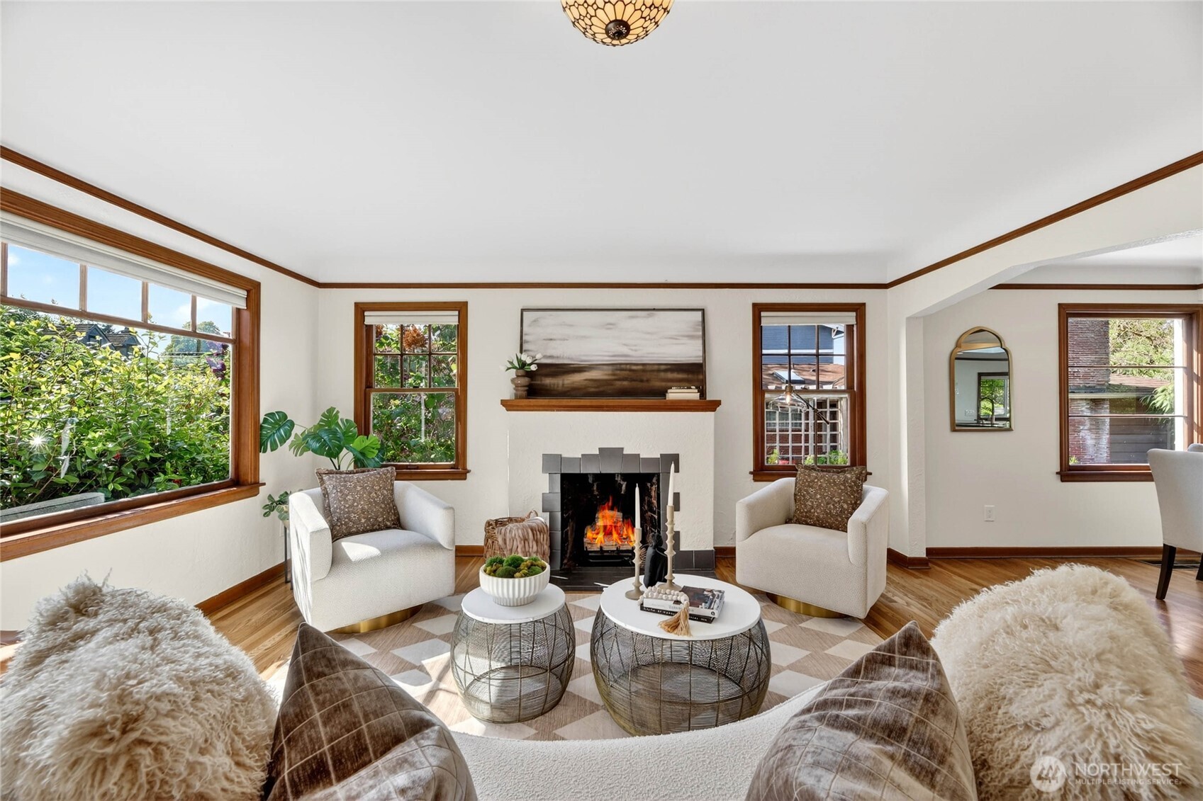 3245 45th Avenue Southwest Seattle, WA 98116 - Photo 4 of 31 a living room with furniture fireplace and a large window