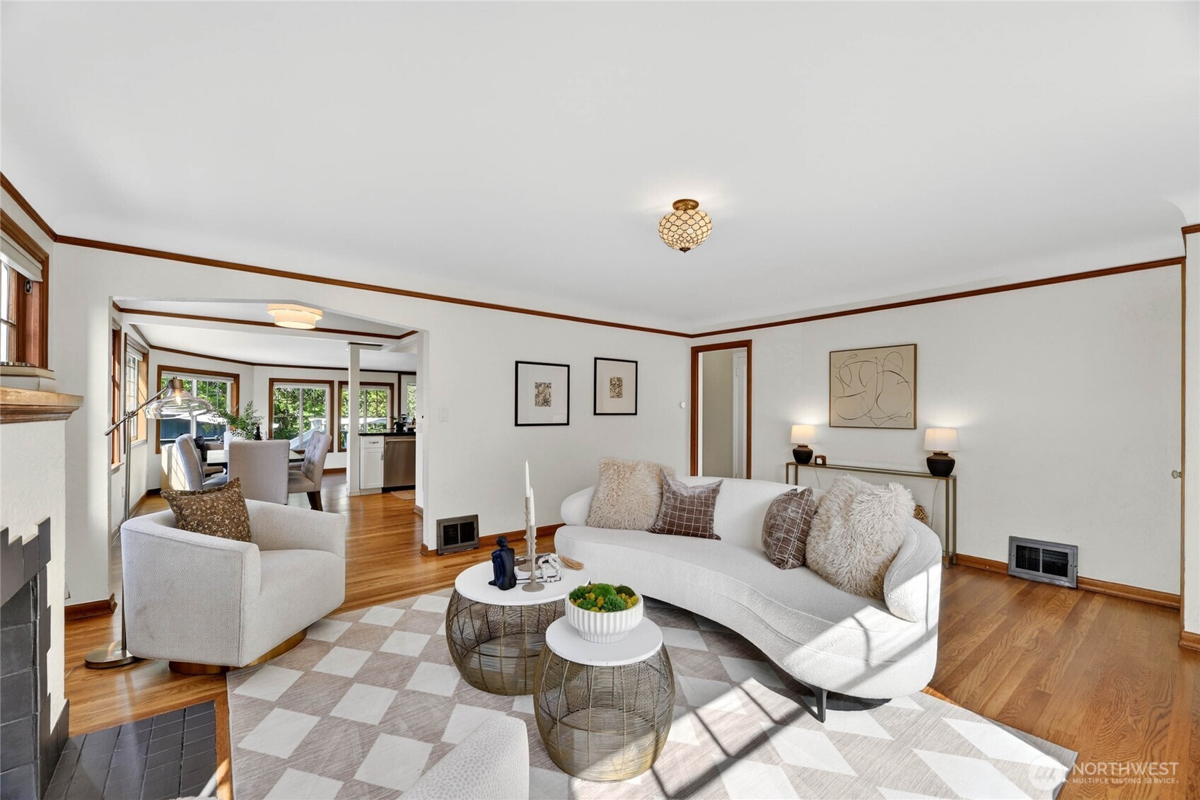 3245 45th Avenue Southwest Seattle, WA 98116 - Photo 6 of 31 a living room with furniture and a large window