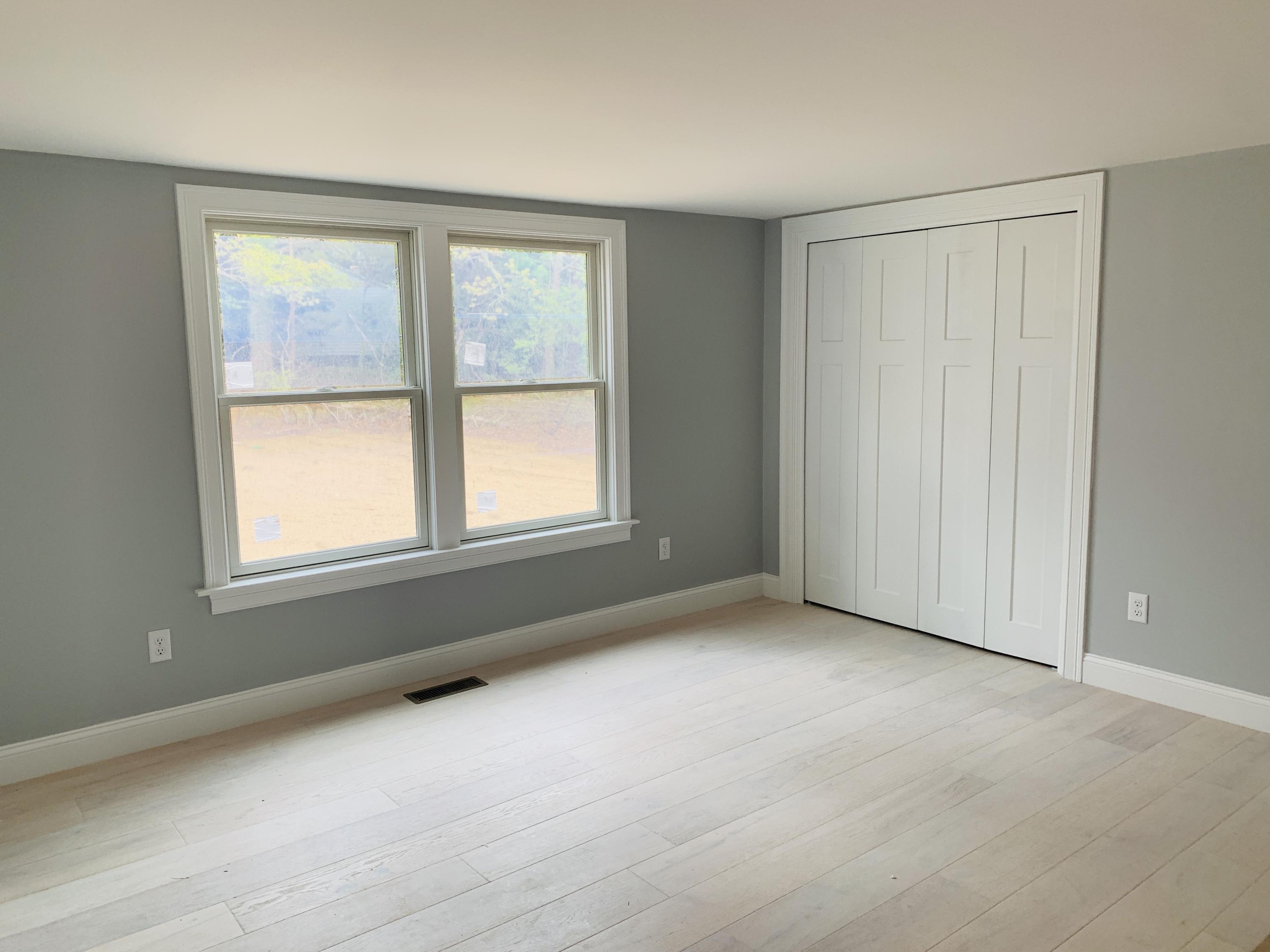 152 Barley Neck Road Orleans, MA 02653 - Photo 8 of 16 a view of an empty room with a window