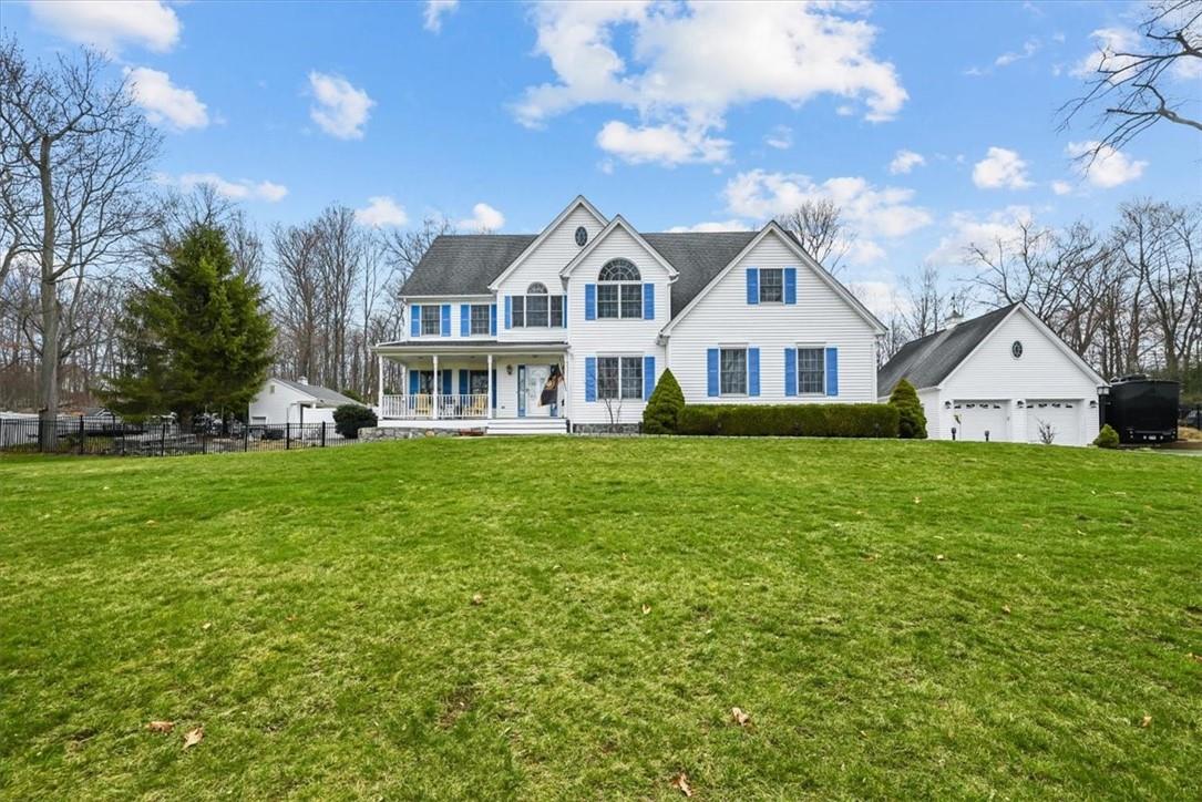 89 Enoch Crosby Road Brewster, NY 10509 - Photo 1 of 1 a front view of a house with garden